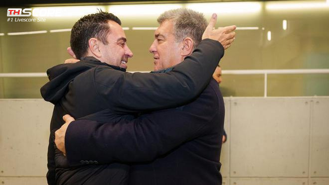 ลาปอร์ตากอดชาบีหลังจบเกมเพื่อแสดงความยินดี  รูปคู่นี้ปิดข่าวลือ