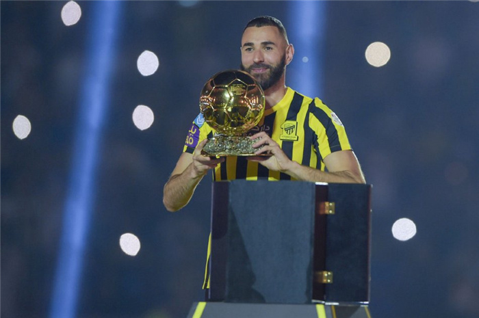 Benzema made his official debut at Al-Jazeera's home stadium, showcasing the Ballon d'Or trophy.